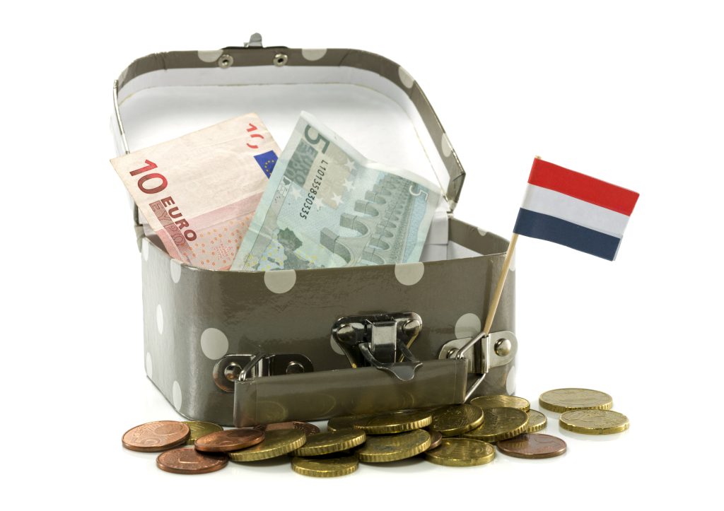 suitcase with dutch flags and money